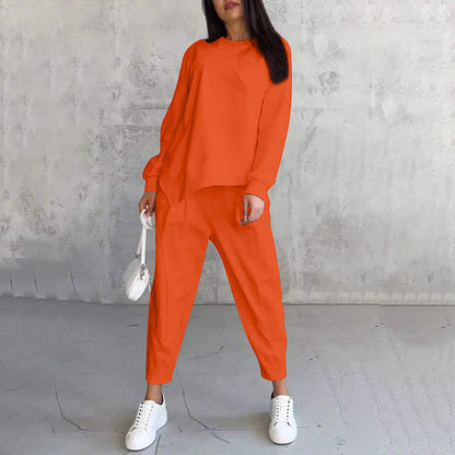 Noemi  —  Conjunto de Sudadera y Pantalones con Dobladillo Asimétrico