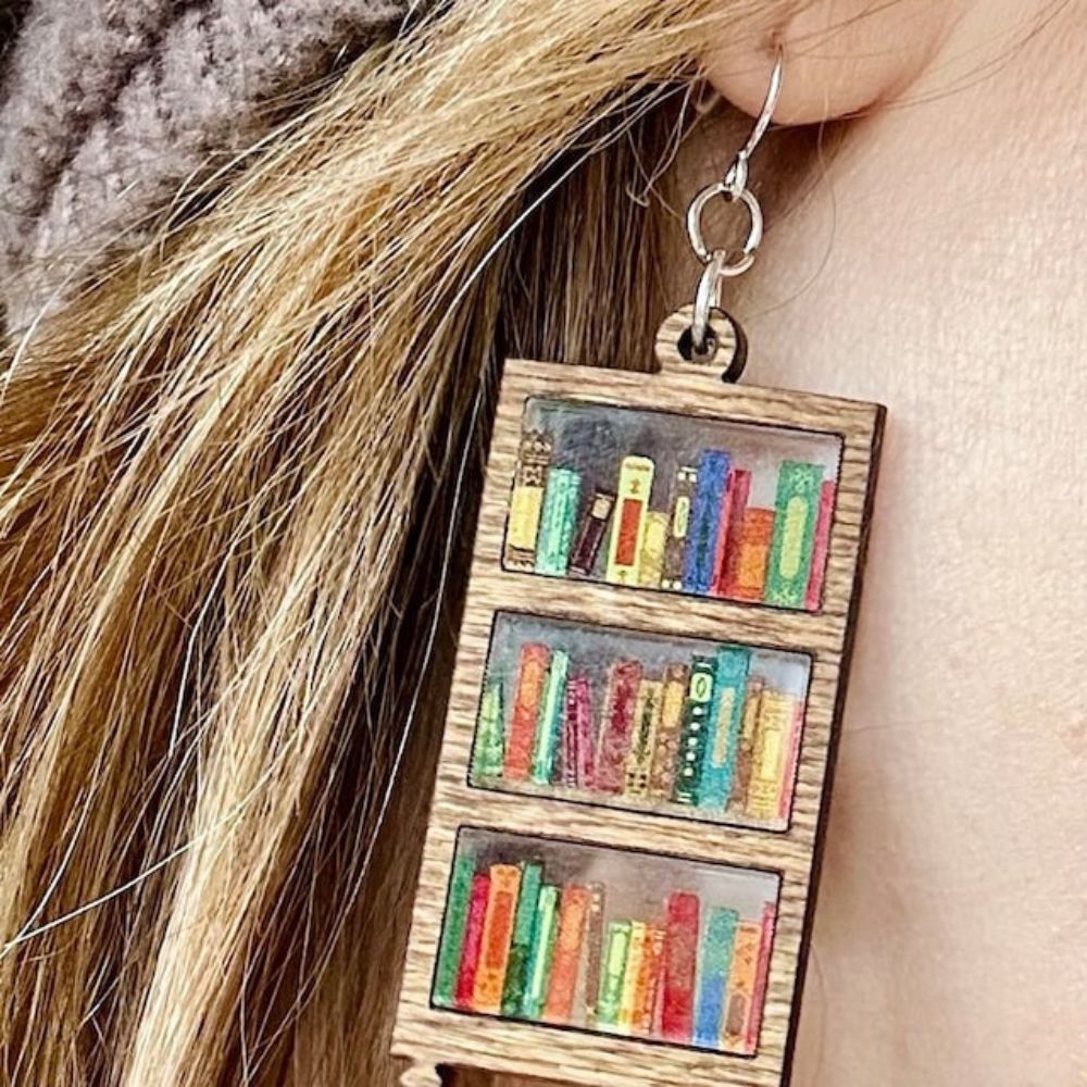 Diseño de Libro Retro — Pendientes de Gota de Lector Expresivo