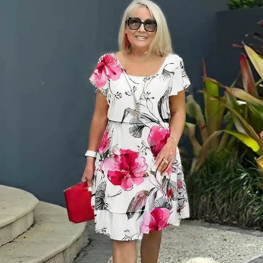 NATURALEZA A TUS PIES - Vibrante Vestido Cascada de Estampado Floral Multi-Planta