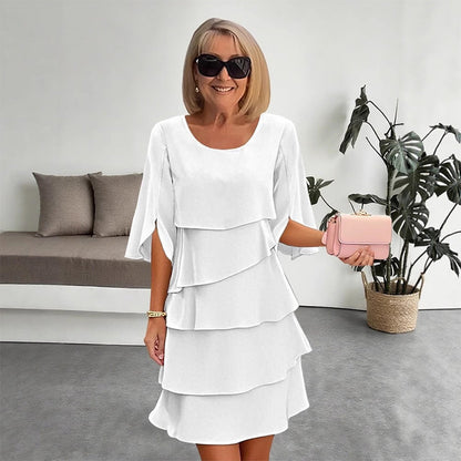 Cascelle  —  Vestido midi de gasa con capas y volantes de cuello redondo